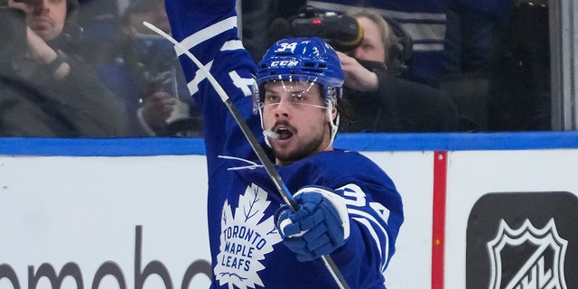 Toronto Maple Leafs striker Auston Matthews (34) scores the winning goal against the then Tampa Bay Lightning during the third period of Game 5 of a series of NHL Stanley Cup hockey first round playoffs on Tuesday May 10, 2022 in Toronto.