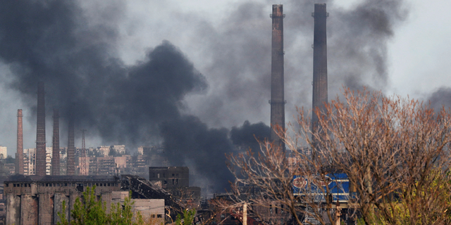 Smoke rises above the Azovstal Iron and Steel Works factory in the southern port city of Mariupol, Ukraine, Monday, May 2.