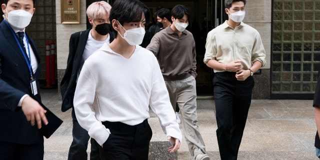 Members of the South Korean band BTS exit the South Korean Consulate during the 76th Session of the United Nations General Assembly in Manhattan, New York, U.S., September 21, 2021.