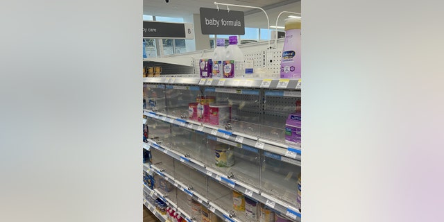 Shelves where baby formula is normally available are nearly bare.  