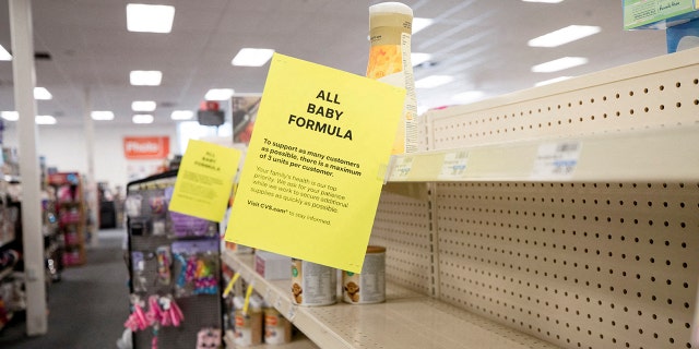 Empty shelves show a shortage of baby formula at a CVS store in San Antonio, Texas.