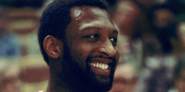 Bob Lanier of the Detroit Pistons smiles during a game in 1974 at the Boston Garden in Boston.