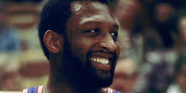 Bob Lanier of the Detroit Pistons smiles during a game in 1974 at the Boston Garden in Boston.