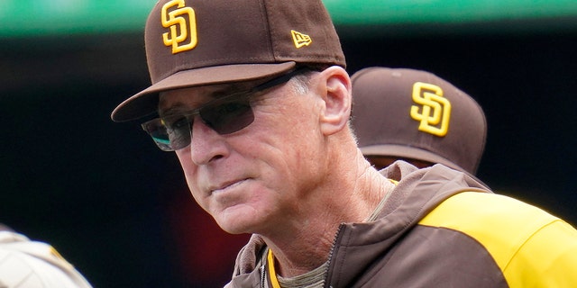 FILE - San Diego Padres manager Bob Melvin stands in the dugout during the first inning of a baseball game against the Pittsburgh Pirates in Pittsburgh, May 1, 2022. 