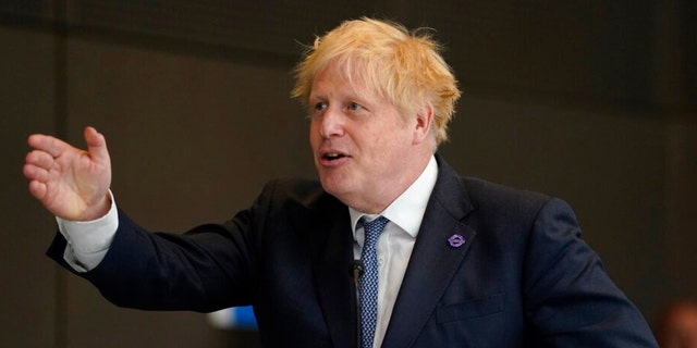 Britain Prime Minister Boris Johnson gives a speech at Paddington Station in London May 17, 2022. 