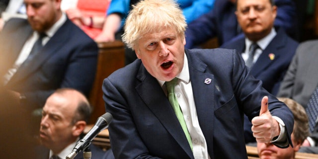 In this photo issued by U.K. Parliament, Britain Prime Minister Boris Johnson speaks during Prime Minister's Questions in the House of Commons, London, May 18, 2022.