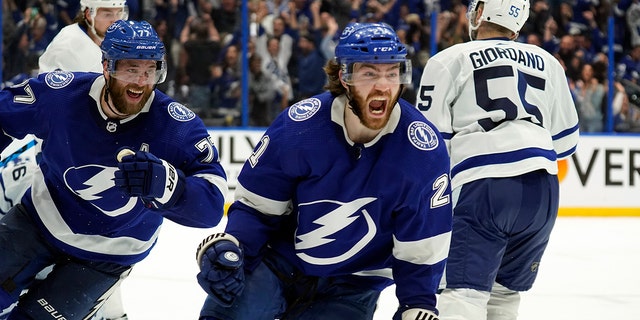 Lightning center Brayden Point celebrates after scoring during sudden-death overtime Thursday, May 12, 2022, in Tampa, Florida.