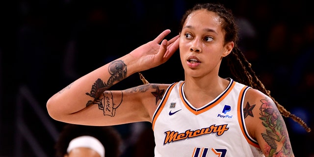 Brittney Griner of the Phoenix Mercury celebrates during the WNBA Finals on Oct. 17, 2021, at the Wintrust Arena in Chicago.