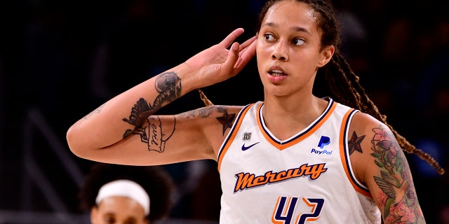 Brittney Griner of the Phoenix Mercury celebrates during Game 4 of the 2021 WNBA Finals Oct. 17, 2021, at the Wintrust Arena in Chicago.