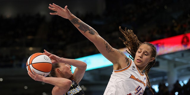 Courtney Vandersloot (22) of the Chicago Sky drives to the basket against Brittney Griner (42) of the Phoenix Mercury during Game 4 of the WNBA Finals at Wintrust Arena Oct. 17, 2021 in Chicago.