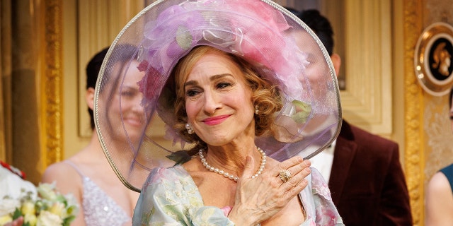 Sarah Jessica Parker greets attendees during curtain call for her new play "Plaza Suite" on opening night in New York, March 28, 2022.