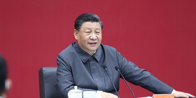 Chinese President Xi Jinping, also general secretary of the Communist Party of China Central Committee and chairman of the Central Military Commission, sits down with representatives of teachers and students at a symposium and delivers an important speech during a visit to Renmin University of China in Beijing, capital of China, April 25, 2022. (Photo by Ju Peng/Xinhua via Getty Images)