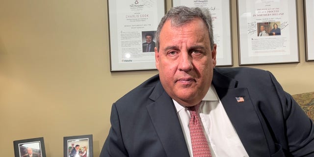 Former New Jersey Gov. Chris Christie is interviewed by Fox News on March 21, 2022, at the New Hampshire Institute of Politics in Goffstown, N.H.