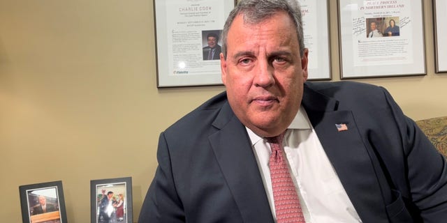 Former New Jersey Gov. Chris Christie is interviewed by Fox News on March 21, 2022, at the New Hampshire Institute of Politics in Goffstown, N.H.