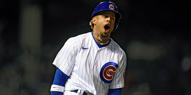 Cubs' Christopher Morel reacts after hitting a solo home run against the Pittsburgh Pirates Tuesday, 可能 17, 2022, 在芝加哥.