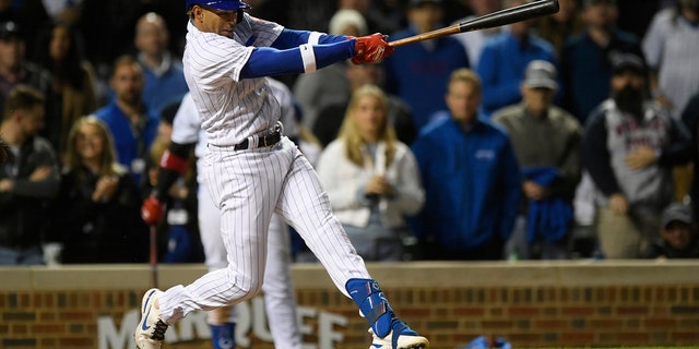 Cubs' Christopher Morel watches his solo home run in his first major league at bat Tuesday, Maggio 17, 2022, a Chicago.