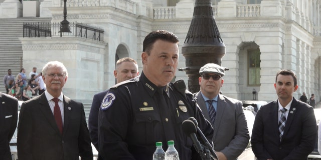 Gus Papathanasiou, chairman of the United States Capitol Police Labor Committee, speaks outside the Capitol building about legislation that would help first responders buy homes.