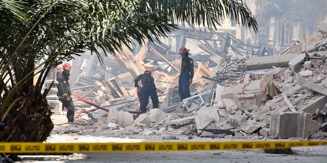 Rescuers work after an explosion at the Saratoga Hotel in Havana, Cuba, Friday, May 6.