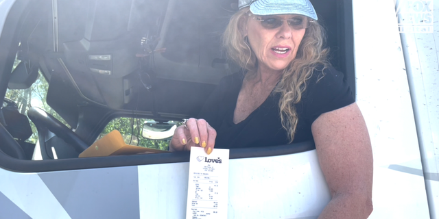 Debra, a truck driver from Tennessee, shows her $999 dollar receipt from the gas station today (Fox News Digital)