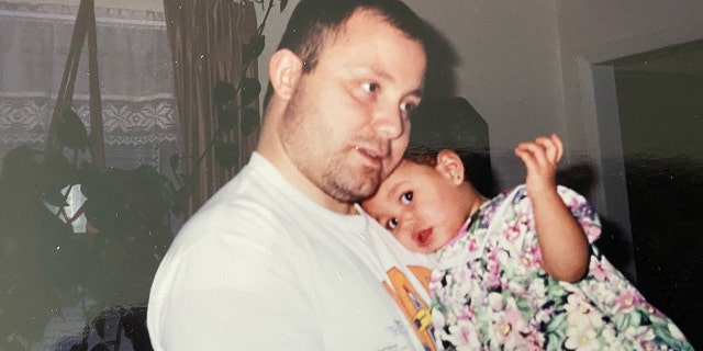 Danielle Larracuente, seen here as a child with her father, said education was a priority.