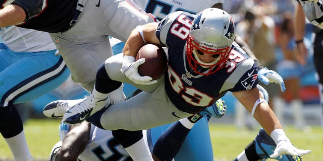 New England Patriots running back Danny Woodhead (39) dives for yardage in the first half of their NFL football game against the Tennessee Titans in Nashville, Tennessee September 9, 2012.