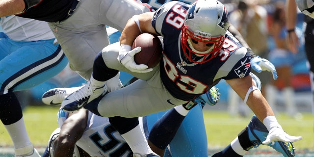 New England Patriots running back Danny Woodhead (39) dives for yardage in the first half of their NFL football game against the Tennessee Titans in Nashville, Tennessee September 9, 2012.