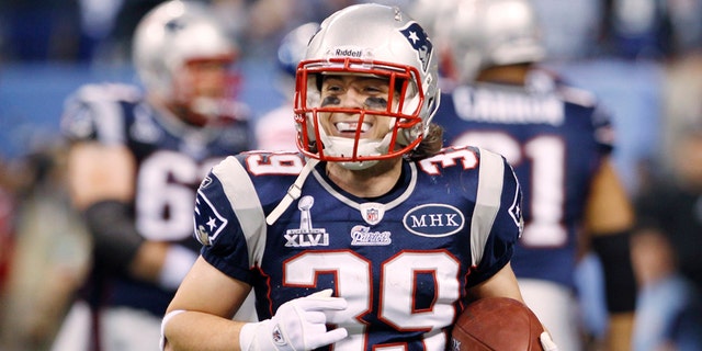 New England Patriots running back Danny Woodhead celebrates after his touchdown in the end of the second quarter during their NFL Super Bowl XLVI football game against the New York Giants in Indianapolis, Indiana, February 5, 2012.
