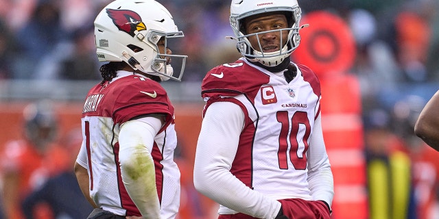 Arizona Cardinals quarterback Kyler Murray (1) and Arizona Cardinals wide receiver DeAndre Hopkins (10) chat during a game between the Arizona Cardinals and the Chicago Bears on December 5, 2021 at Soldier Stadium, in Chicago, IL.
