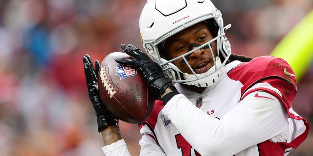 DeAndre Hopkins #10 of the Arizona Cardinals celebrates his touchdown during a game against the Cleveland Browns at FirstEnergy Stadium on October 17, 2021 in Cleveland, Ohio.