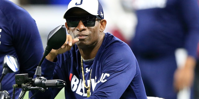 Jackson State Tigers head coach Deion Sanders during the warmup before the College Football Cricket Celebration Bowl game between the South Carolina State Bulldogs and the Jackson State Tigers at Mercedes-Benz Stadium on December 18, 2021 in Atlanta, Georgia. 
