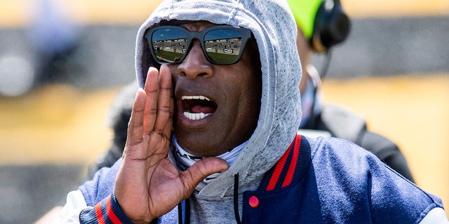 Jackson State head coach Deion Sanders during warmups before the Alabama State University game at Hornet Stadium on the ASU campus in Montgomery, Ala., March 20, 2021.