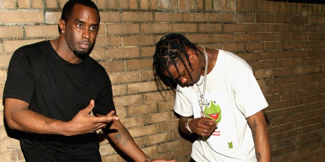 Rappers Puff Daddy and Travis Scott attend the BET Hip Hop Awards Show 2015 at the Atlanta Civic Center on October 9, 2015 in Atlanta, Georgia.