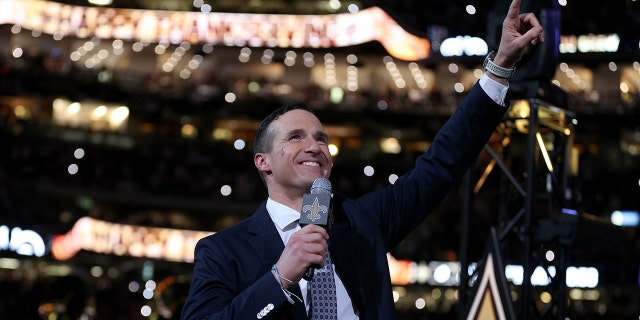 Former New Orleans Saints quarterback Drew Brees speaks to the fans during halftime of the game between the Buffalo Bills and the New Orleans Saints at Caesars Superdome on November 25, 2021 in New Orleans, Louisiana.