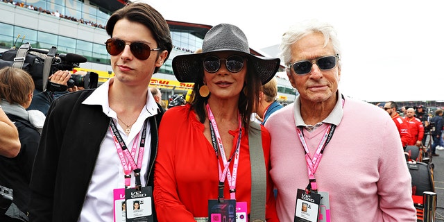 Michael Douglas and Catherine Zeta-Jones' son Dylan Douglas, left, graduated from Brown University.