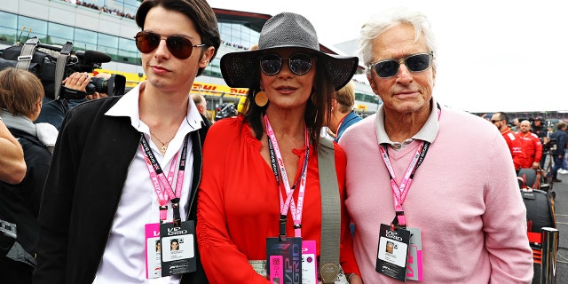 Michael Douglas and Catherine Zeta-Jones' son Dylan Douglas, left, graduated from Brown University.