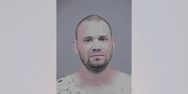 Earl Benjamin Washington, 46, allegedly made threats of mass violence to a Maryland business and elementary school.