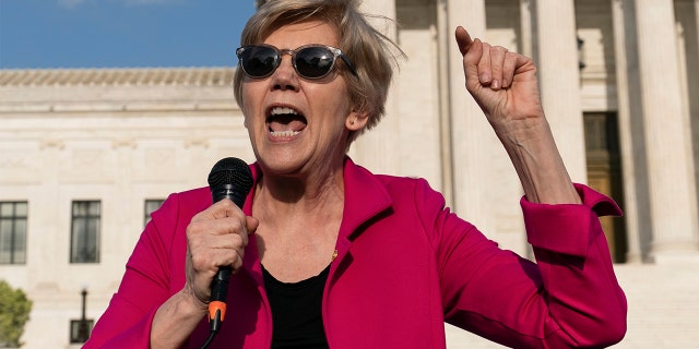 Sen. Elizabeth Warren speaks during a protest outside the U.S. Supreme Court, May 3, 2022 in Washington.