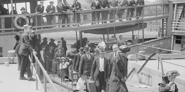 Joseph Owades' parents, Simon and Gussie Owades, arrived at Ellis Island from Eastern Europe like millions of other immigrants who came to America for a better life. Above, immigrants are shown arriving in New York City, Bain News Service, 1920.