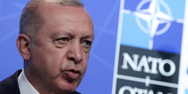 Turkish President Tayyip Erdogan holds a press conference during the NATO summit at the alliance headquarters in Brussels, Belgium, June 14, 2021.