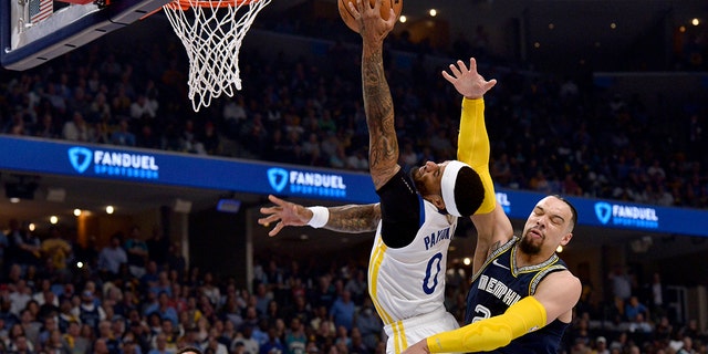 Memphis Grizzlies forward Dillon Brooks (24) fouls Golden State Warriors guard Gary Payton II (0) during the first half of Game 2 of a second-round NBA playoff series Tuesday, May 3, 2022, in Memphis, Tenn. Brooks was ejected. 