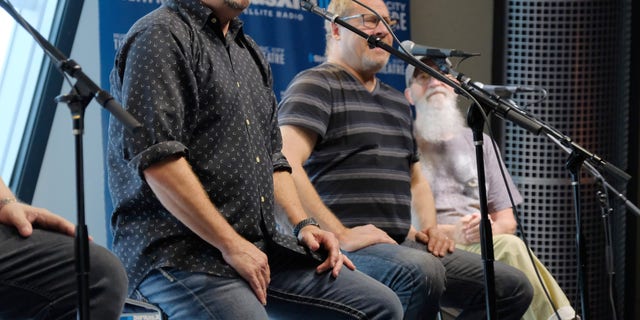 Larry Stewart, Dave Innis and Paul Gregg of the country band Restless Heart visit SiriusXM Studios Aug. 1, 2018, in Nashville. Stewart said he won't be performing at the NRA convention this weekend. 