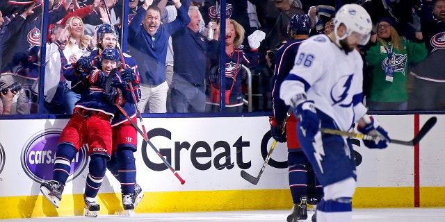 Artemi Panarin of the Blue Jackets is congratulated by Josh Anderson after scoring during the 2019 NHL Stanley Cup Playoffs against the Tampa Bay Lightning on April 16, 2019, in Columbus, Ohio.