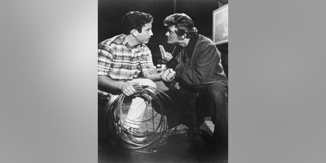 Bo Hopkins (right) as Joe and Richard Dreyfuss as Curt in the film 'American Graffiti', 1973.