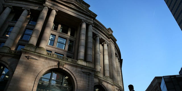 This file image shows a man approaching South Station after the evening rush in Boston, Massachusetts, on July 24, 2019.