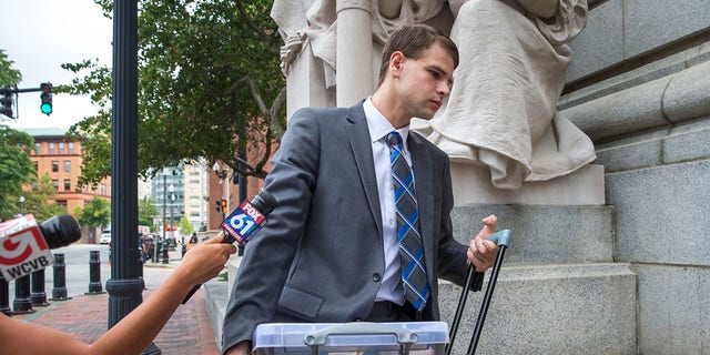 Nathan Carman ignores questions from the media upon his arrival at U.S. District Court for his federal civil trial in Providence, Rhode Island, on Aug. 21, 2019.