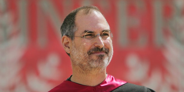 FILE – Steve Jobs, CEO of Apple and CEO of Pixar Animation Studios, speaks during the 114th commencement at Stanford University in Stanford, California on Sunday, June 12, 2005. 