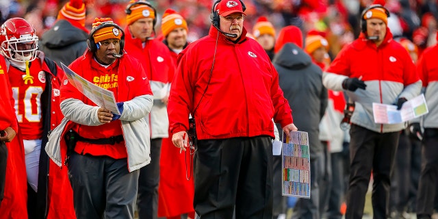 Kansas City Chiefs offensive coordinator Eric Bieniemy watches with head coach Andy Reid of the Kansas City Chiefs during the third quarter of the AFC Championship game against the Tennessee Titans at Arrowhead Stadium Jan. 19, 2020, in Kansas City, Mo.