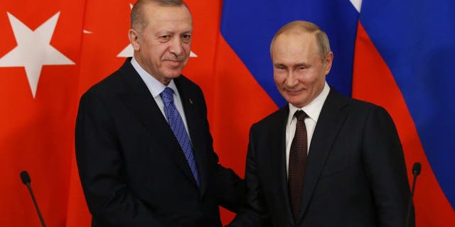 MOSCOW, RUSSIA - MARCH 05:  Russian President Vladimir Putin and Turkish President Recep Tayyip Erdogan shake hands during their talks at the Kremlin on March 5, 2020 in Moscow, Russia. 