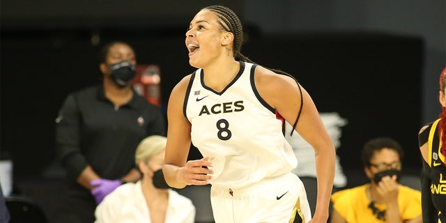 Las Vegas Aces center Liz Cambage yells after a basket on July 2, 2021, at the Los Angeles Convention Center.
