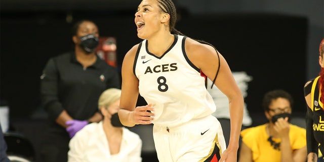 Las Vegas Aces center Liz Cambage yells after making a basket during a game between the Las Vegas Aces and Los Angeles July 2, 2021, at the Los Angeles Convention Center.